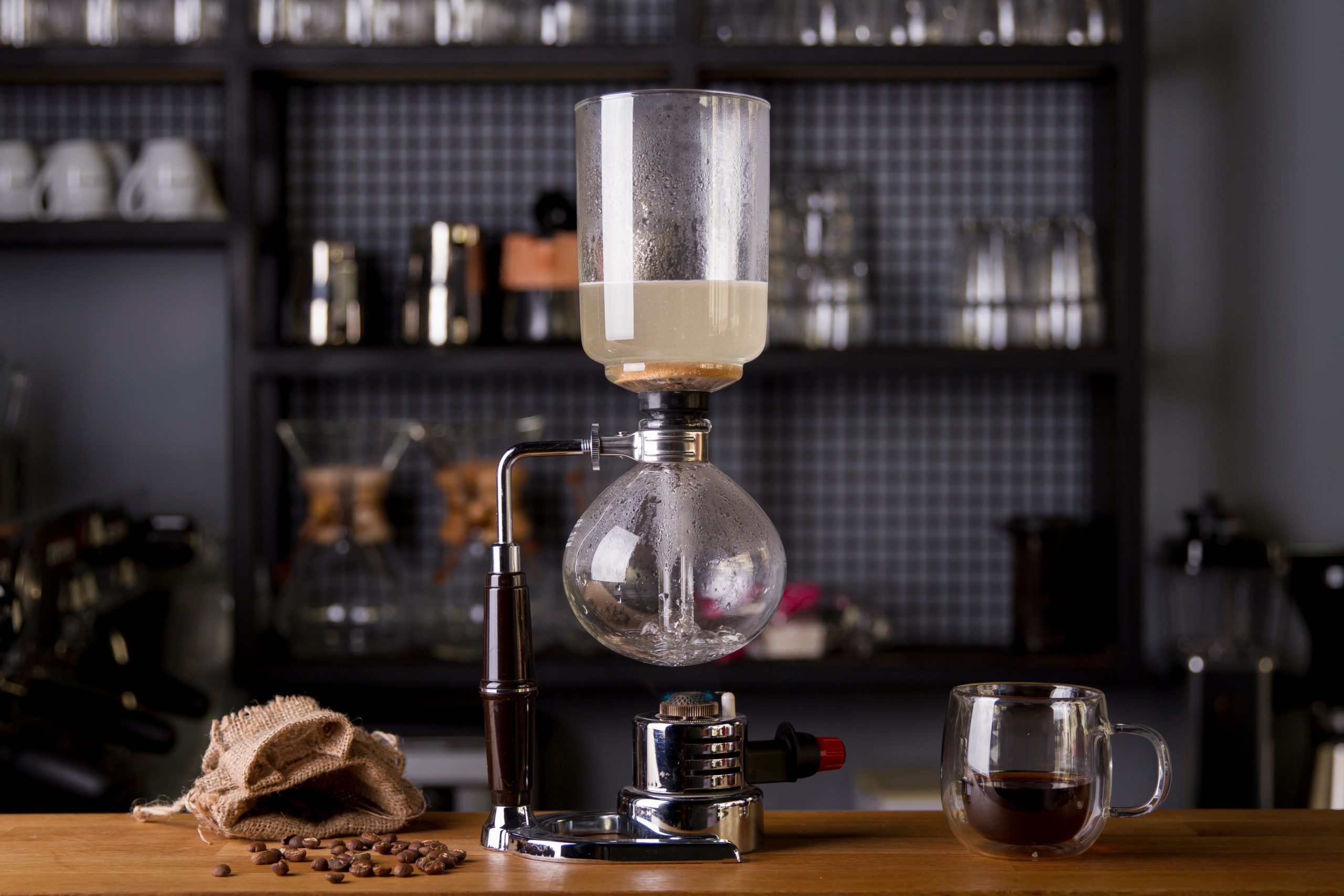A coffee flask on a table.