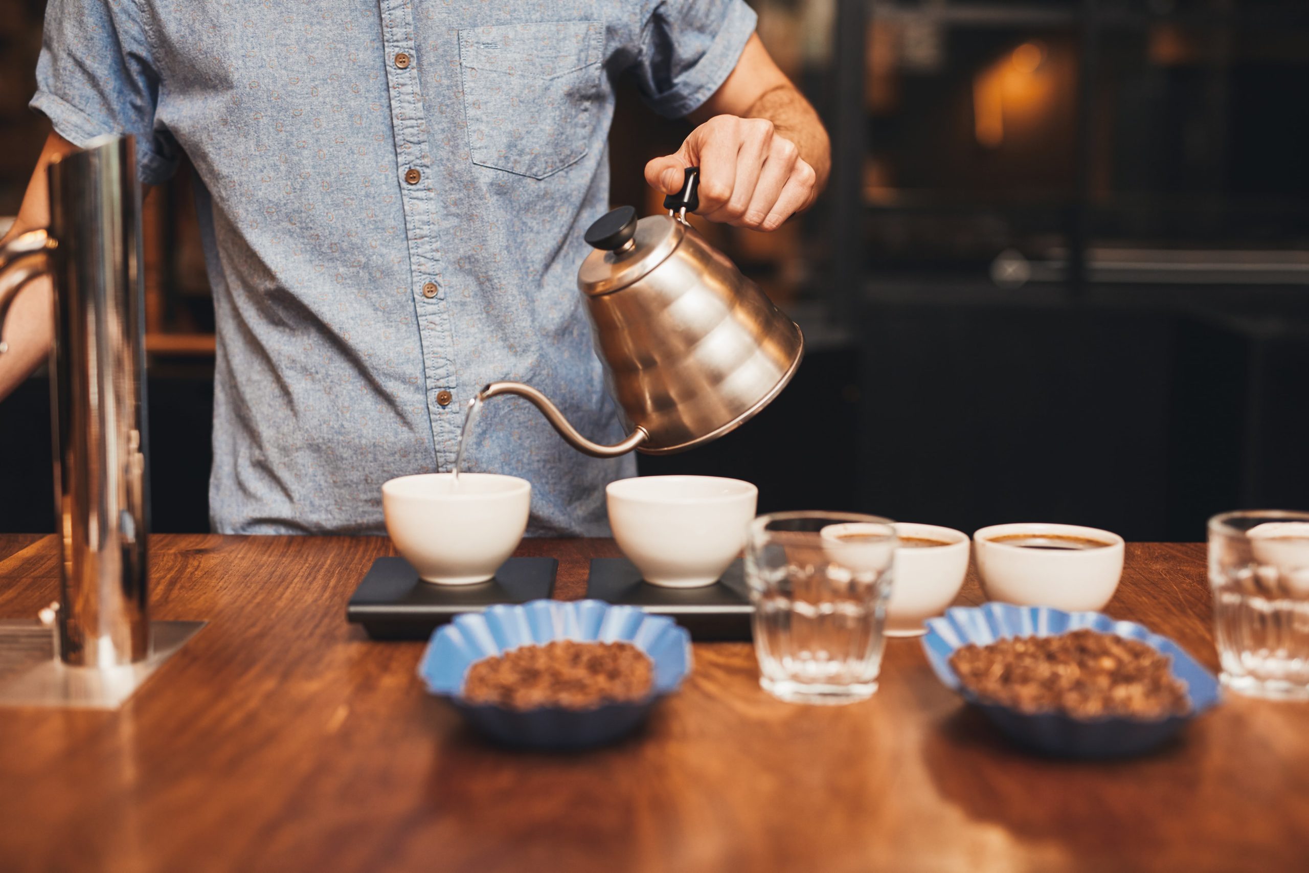 Coffee being poured from a pot.