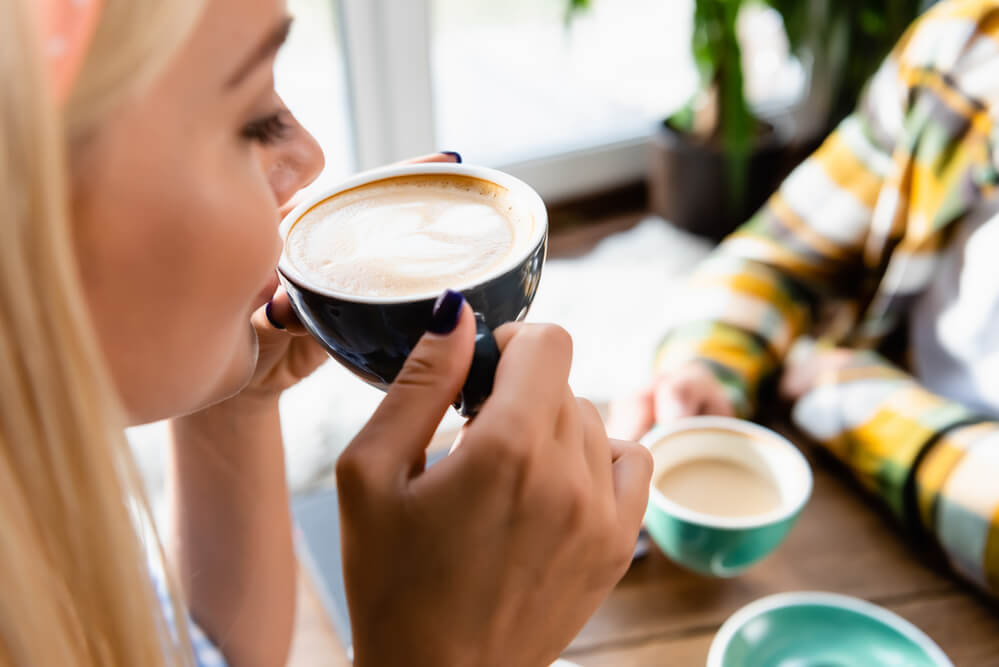 https://fullcoffeeroast.com/wp-content/uploads/2022/02/cropped-view-of-woman-drinking-coffee-near-man-on-blurred-background-1.jpg