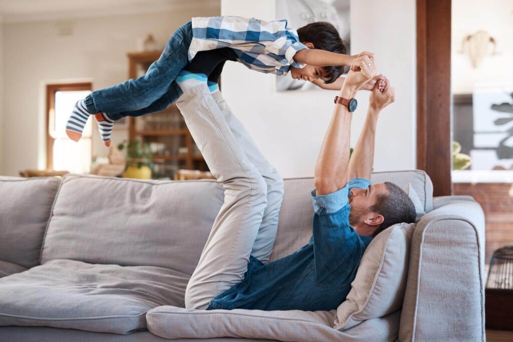 Shot of a man spending quality time with his young son at home