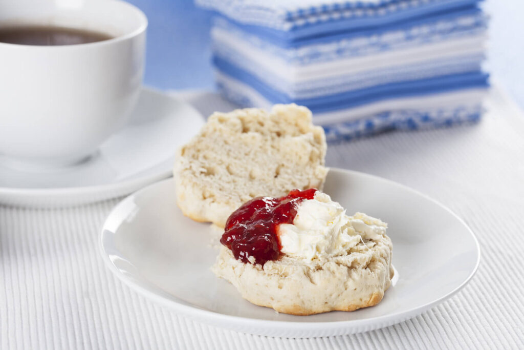 Scone with clotted cream and strawberry jam - what is a Devon cream tea