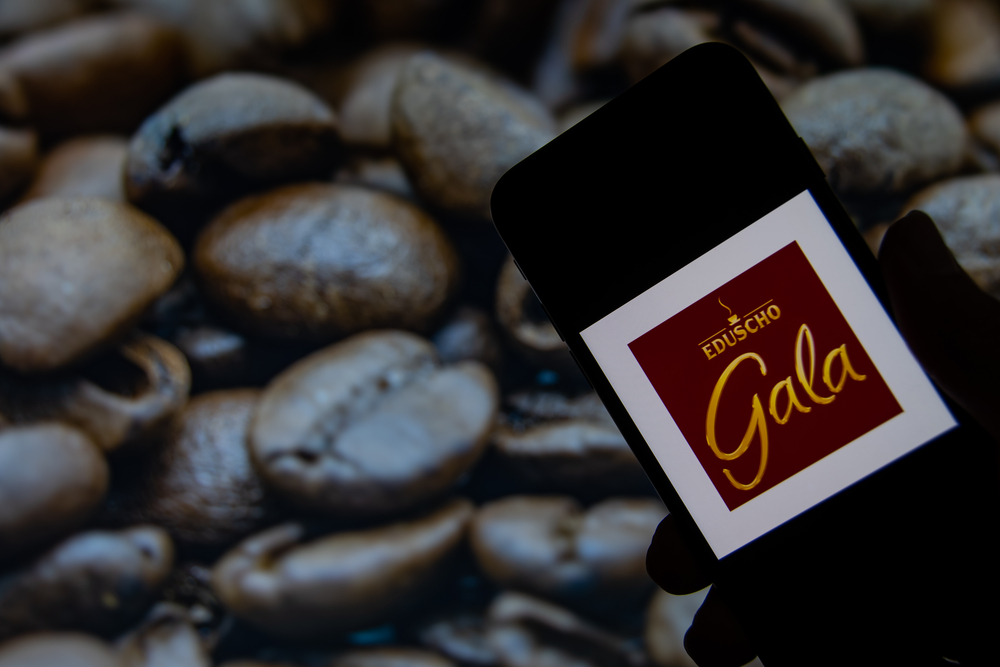 The brand logo of "Eduscho Gala" on the display of a smartphone