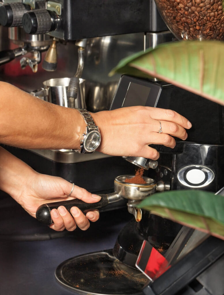 barista making a coffee