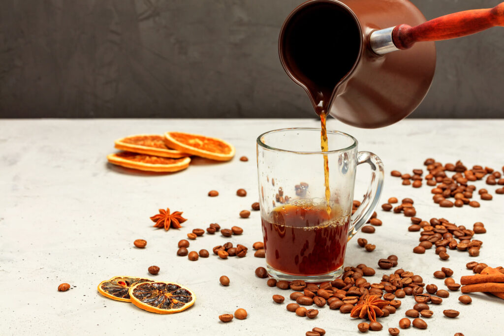 Coffee beans, dried orange, lemon, anise, and cinnamon.