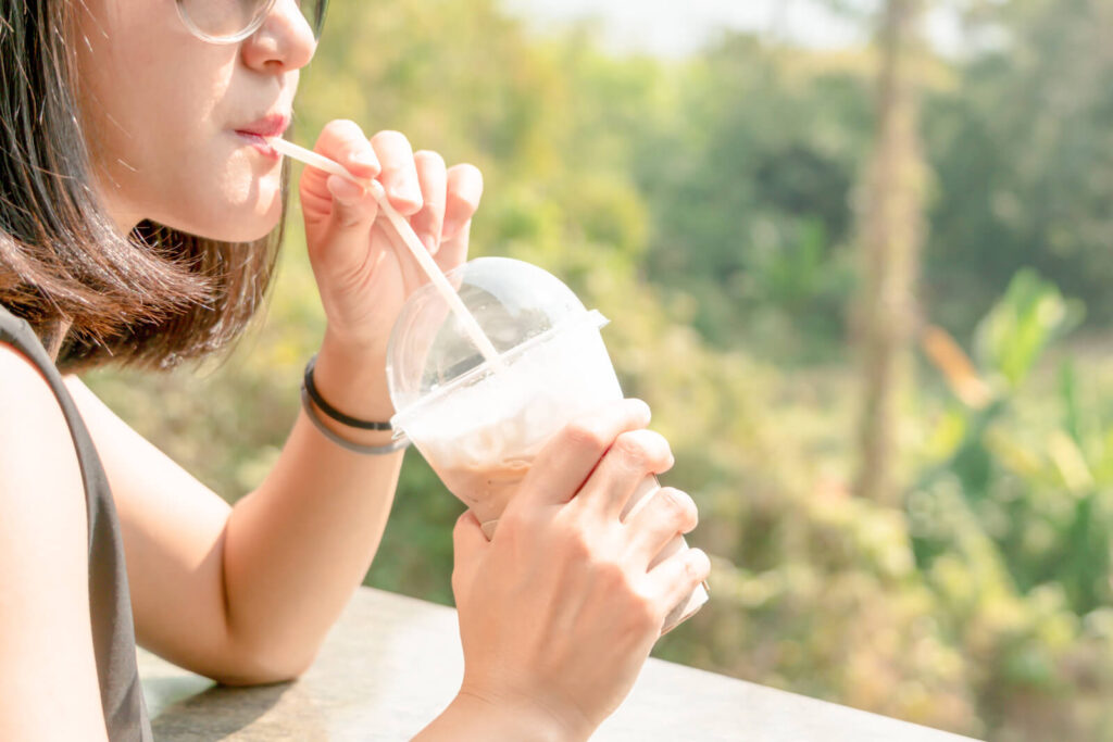 Women enjoy a ice coffee latte in the morning