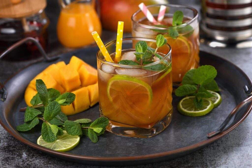 Two glasses of mango ice tea 