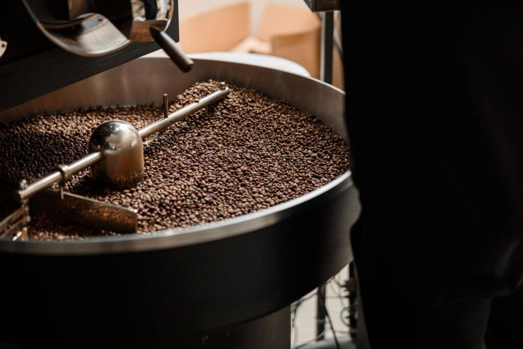 Coffee processing. Roastery, roasting machine and fresh bean