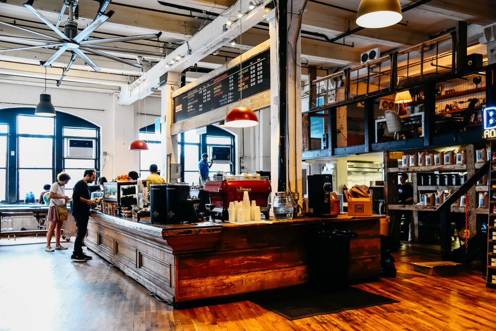 Interior view of Brooklyn Roasting Company, a trendy hipster cafe in Brooklyn