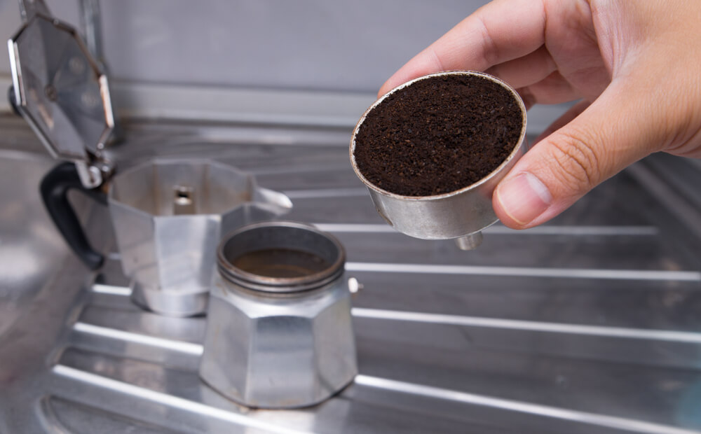 Used ground coffee in Moka pot filter