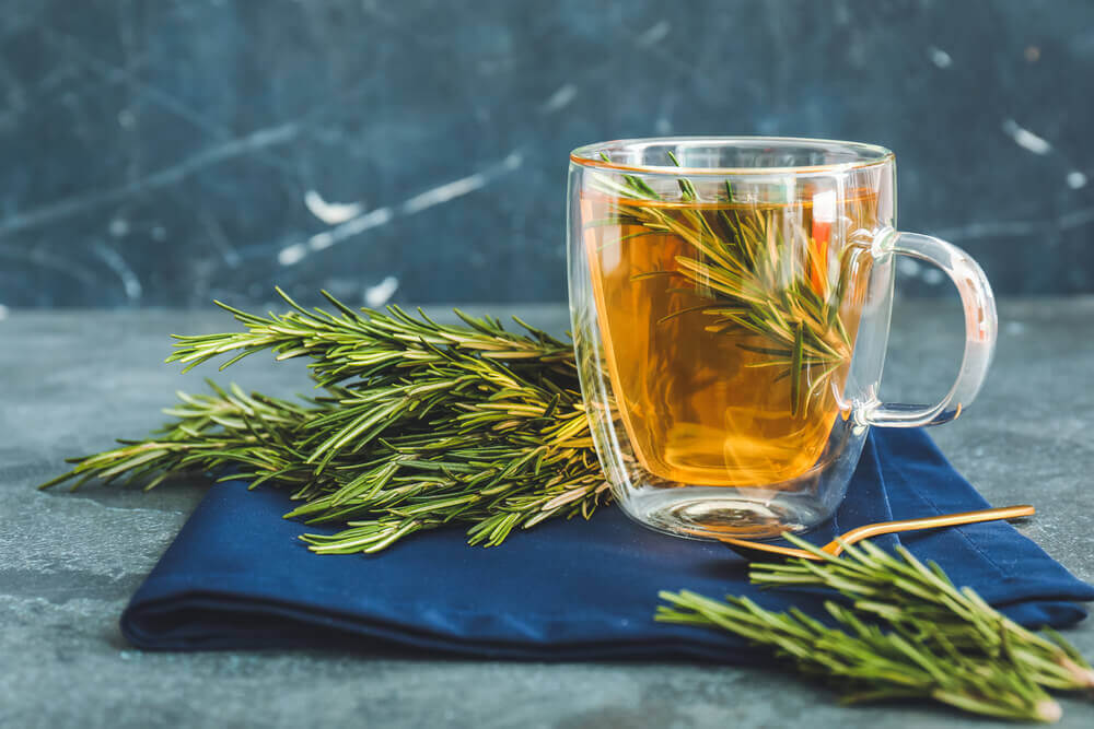Pine needle tea with a blue cloth beneath