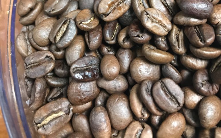 coffee beans with half scorched appearance