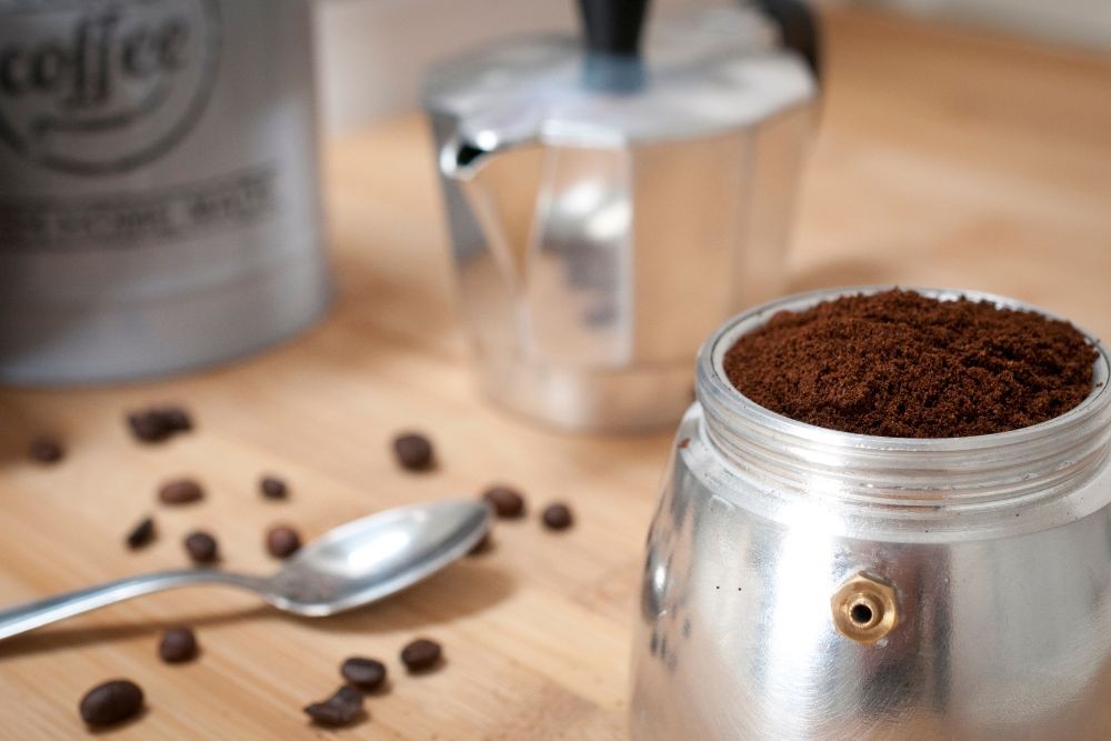 Moka pot full of fresh ground coffee