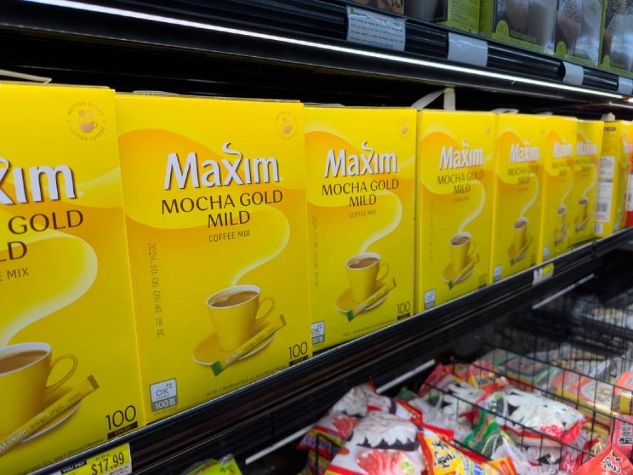 A view of several packages of Maxim Mocha Gold coffee mix, on display at a local grocery store