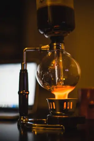 Coffee being brewed with a siphon.