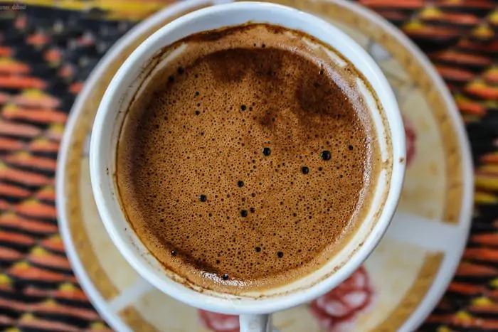 A close up of black coffee in a cup