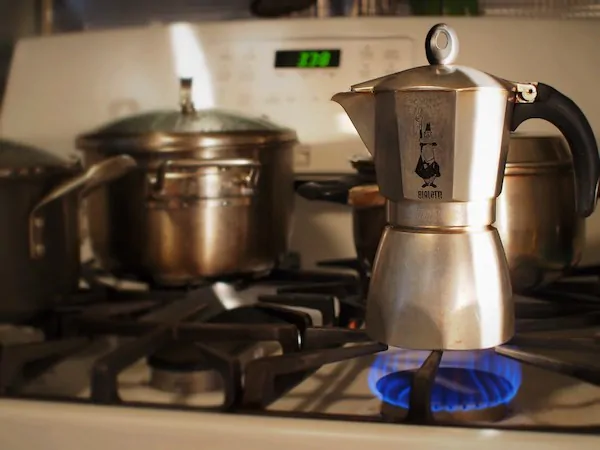 A coffee pot on the stove.