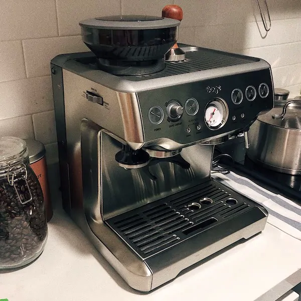 A stove top coffee machine sitting inside of a kitchen - How Long Do Breville Espresso Machines Last