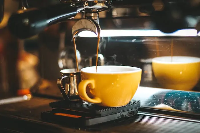 Espresso coffee machine brewing an espresso shot - Why Does My Espresso Taste Sour