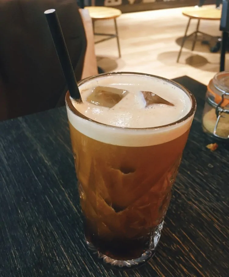 A cup of cold brew coffee in a glass.