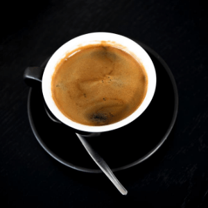 A cup of espresso coffee.