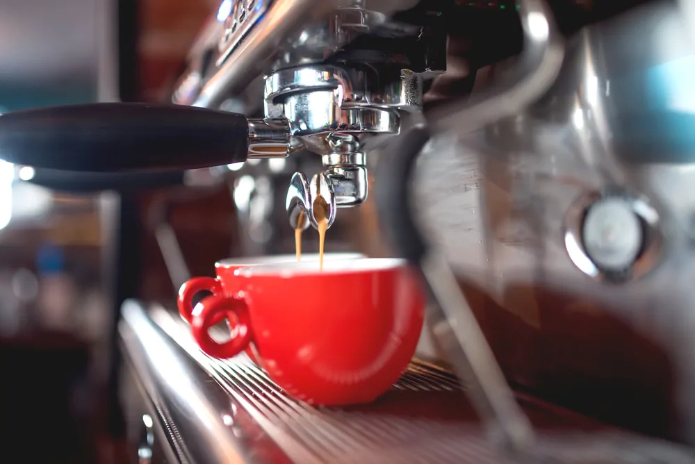 Brewing espresso in a coffee shop