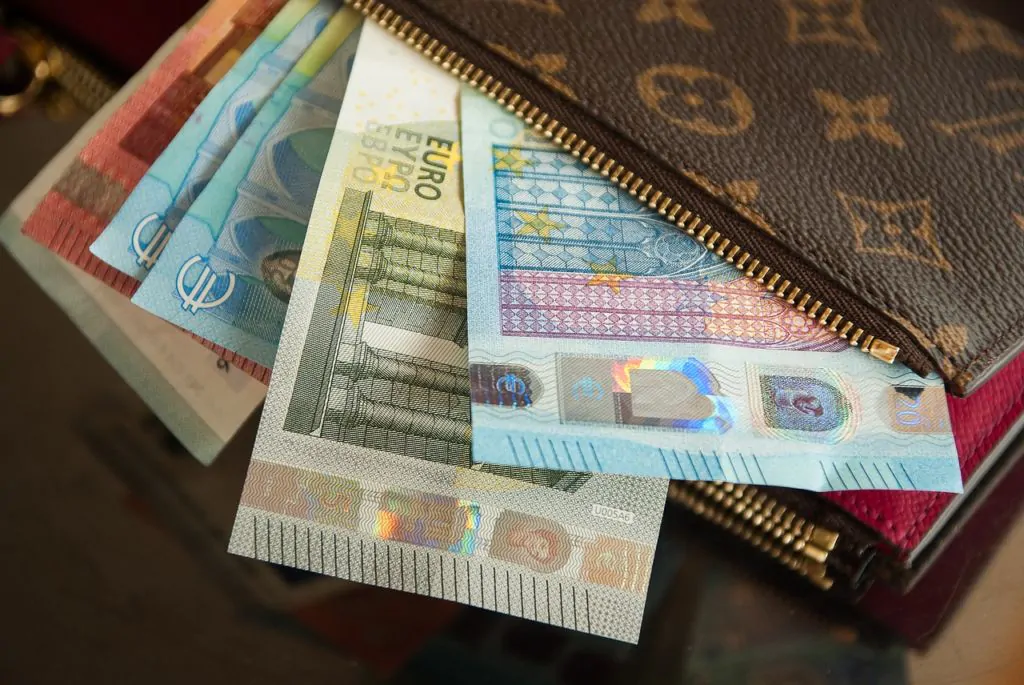wallet full of european money bills
