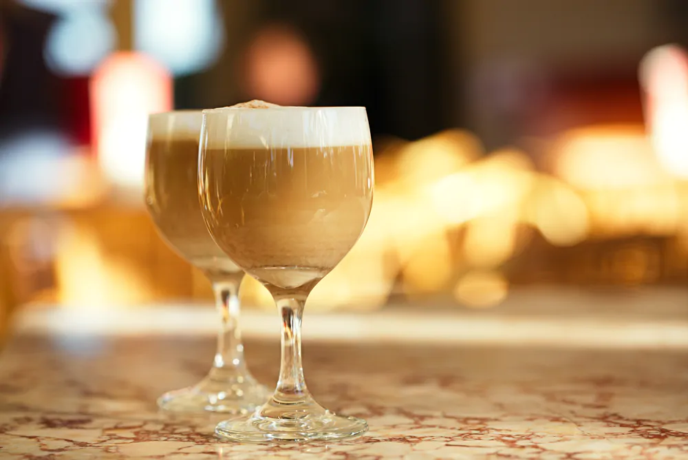 Spanish coffee latte in tall glasses - What's In A Spanish Coffee