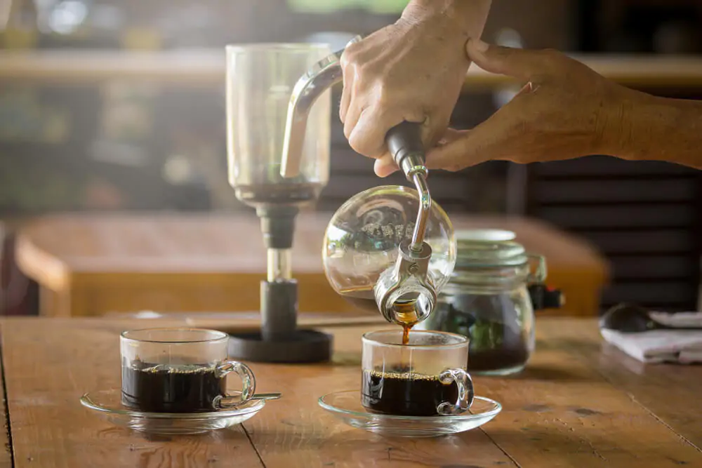 siphon coffee brewer, three cups of coffee