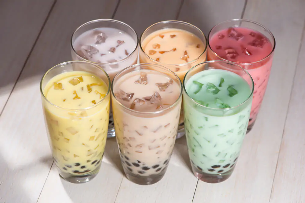 various bubble tea in a wooden table