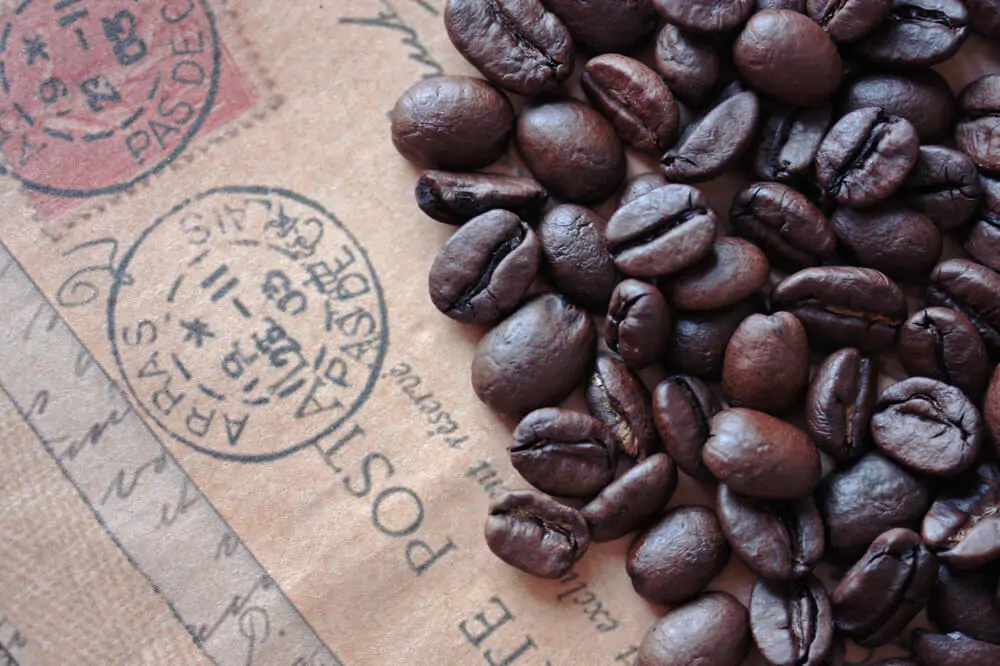 Coffee beans with a coffee bag