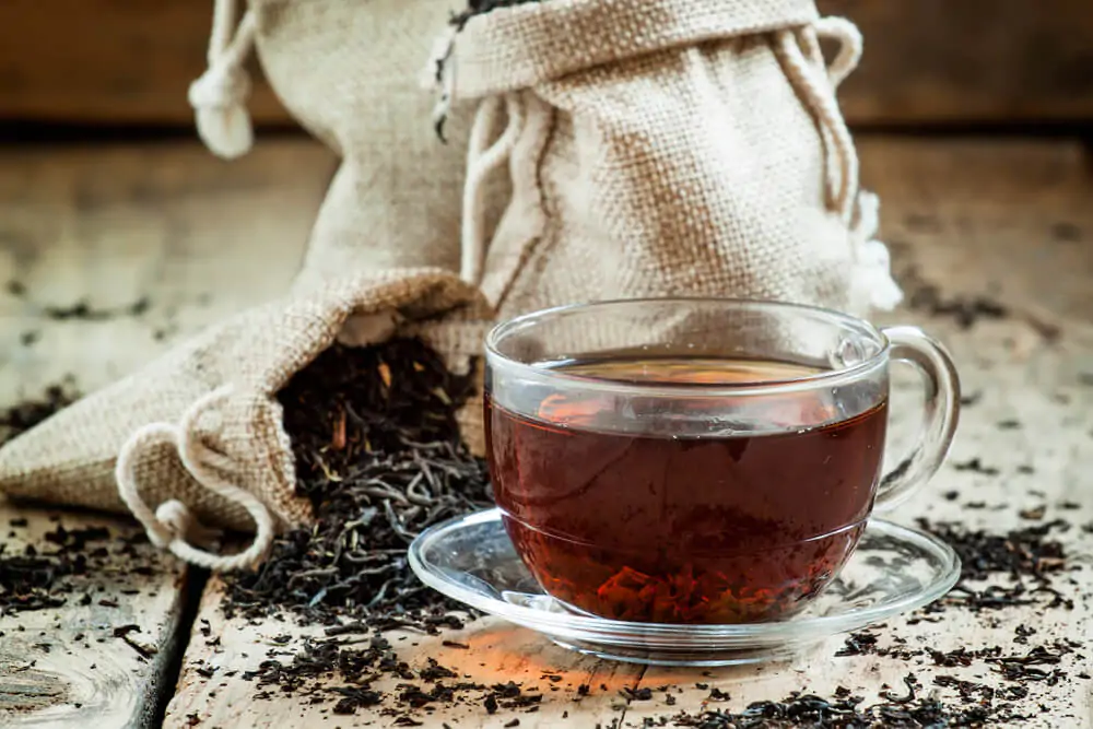 A cup of black tea with Keemun dried leaves - What is Keemun tea 