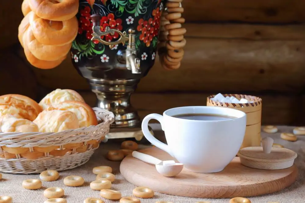 Russian tea from a samovar and pastries in a basket - What is Russian tea