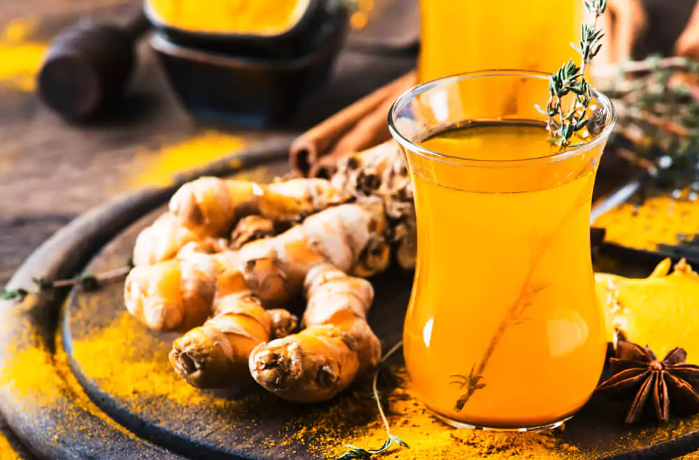 Healthy vegan turmeric golden tea with honey - What is turmeric tea