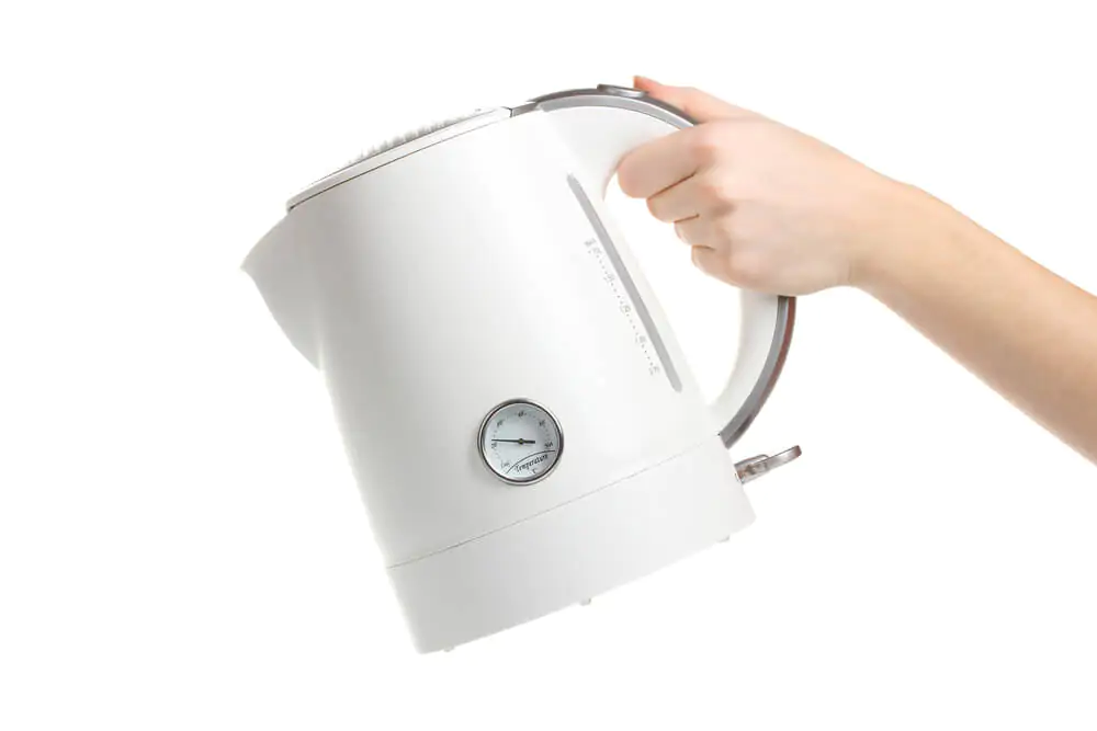 Why do electric kettles have a minimum water level?