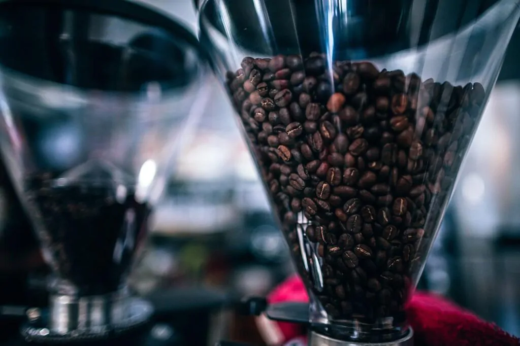 Will oily coffee beans clog a coffee grinder?