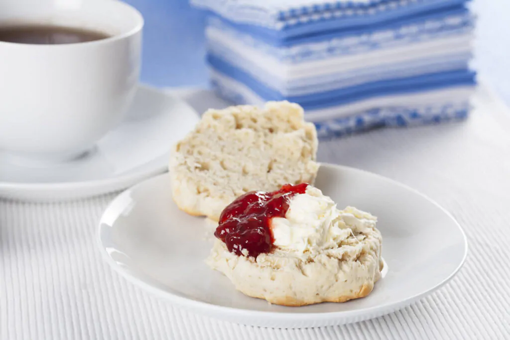 Scone with clotted cream and strawberry jam - what is a Devon cream tea