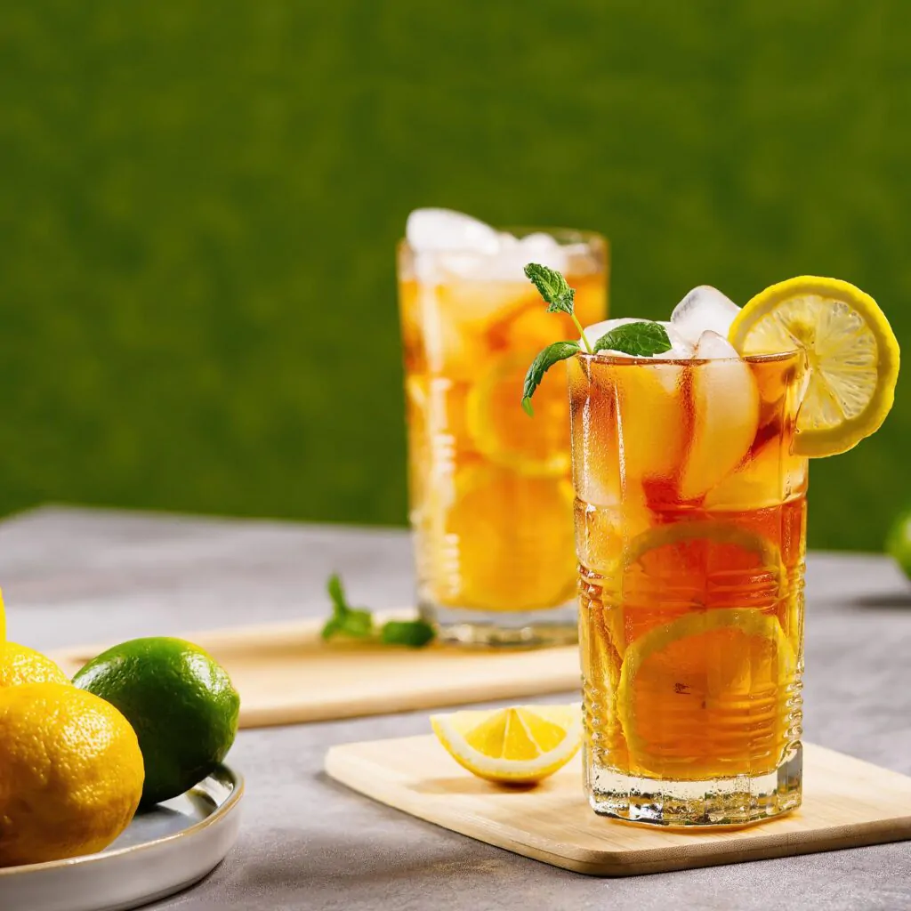 Iced tea with lemon and ice in tall glasses