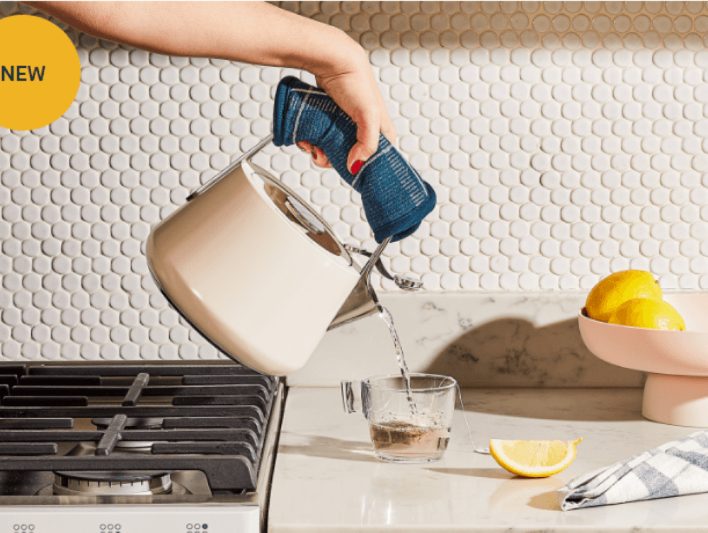 Pouring hot water using caraway tea kettle