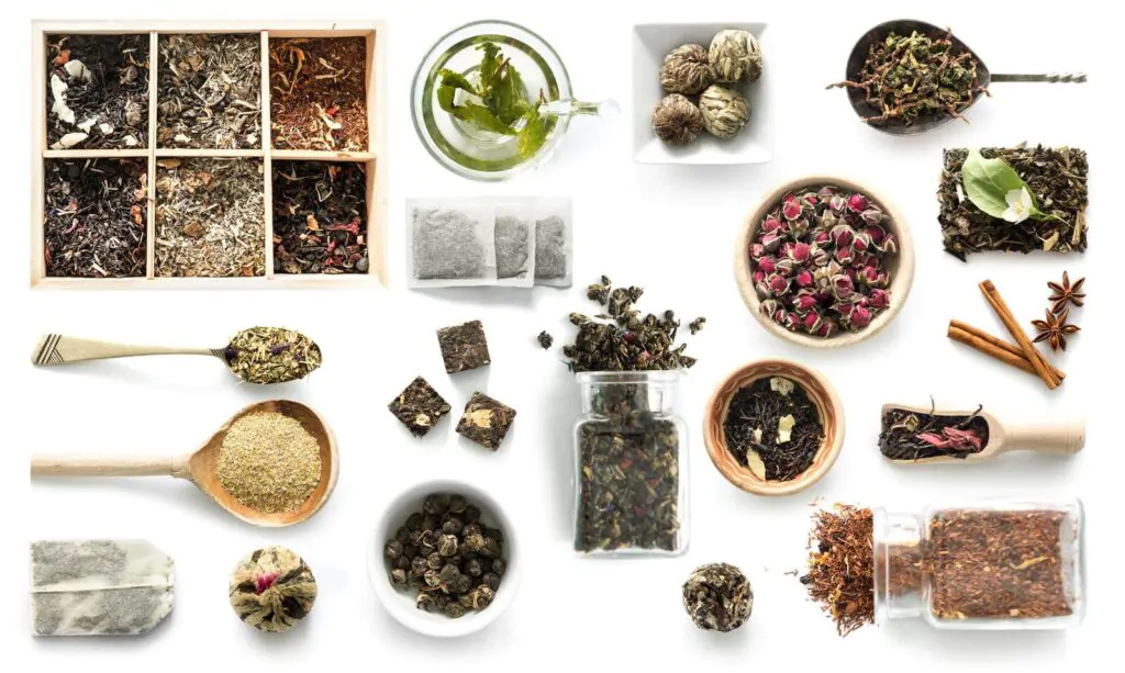Various kinds of tea, rustic dishware, cinnamon