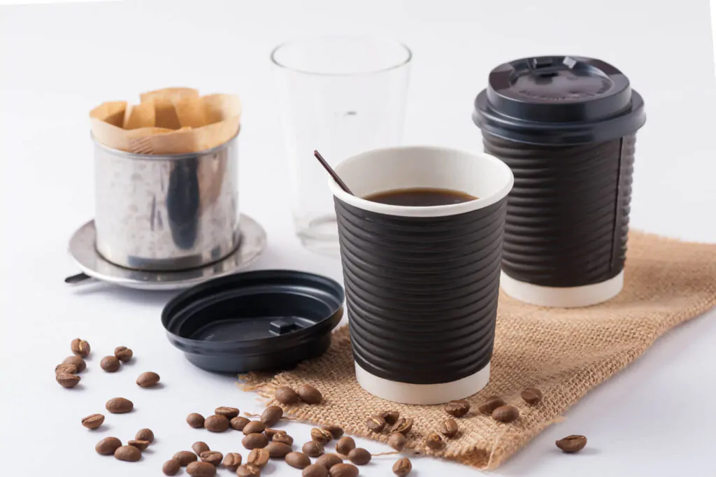Take away paper coffee cup with metal coffee filter