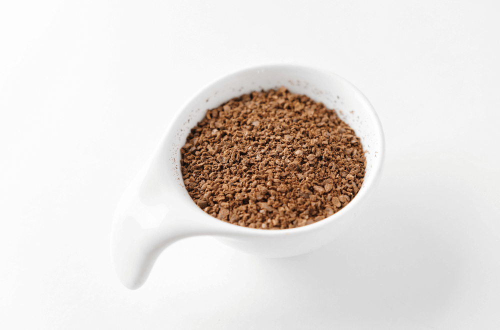 Coarsely grind coffee beans
