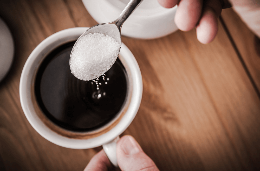 Adding sugar to black coffee