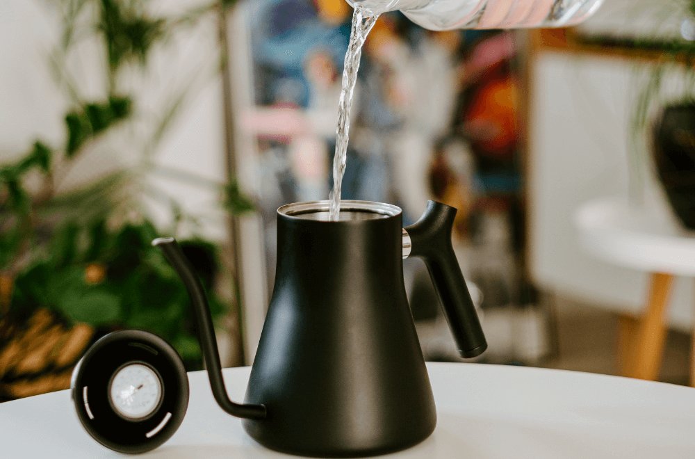Filling water in tea kettle