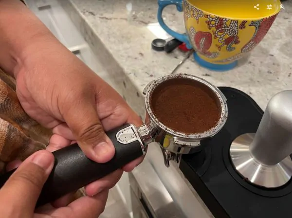Grind a coffee in espresso machine