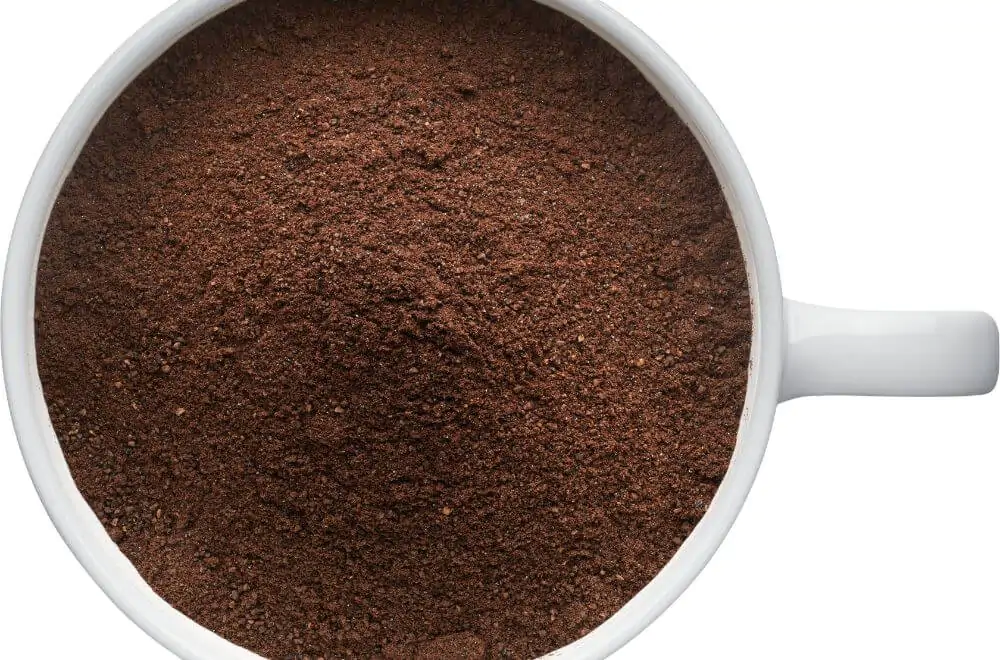 A coffee cup filled with coffee powder