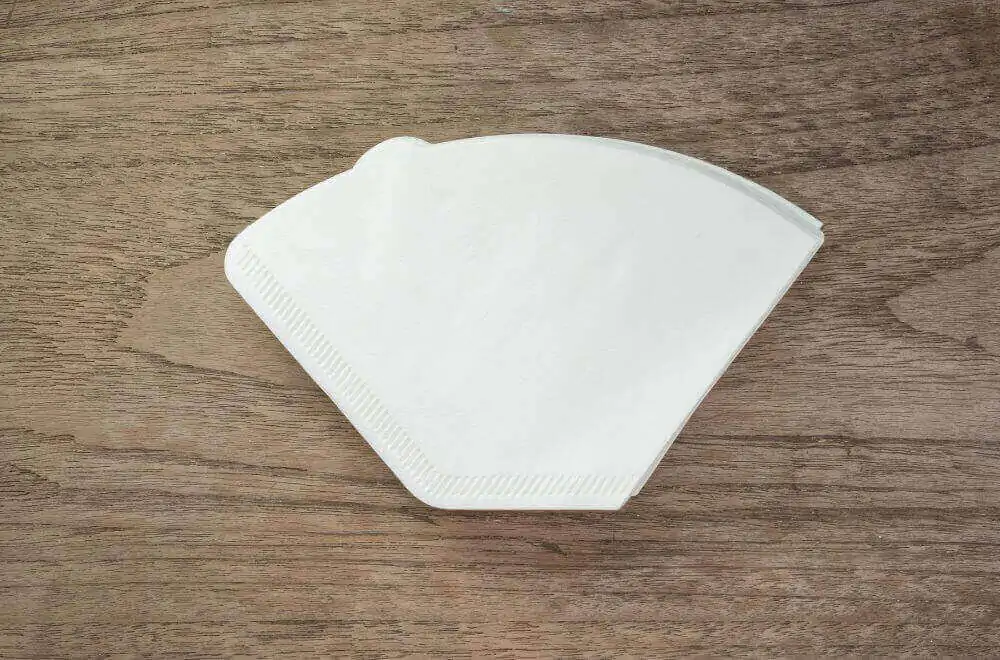 Coffee filter paper on a wood