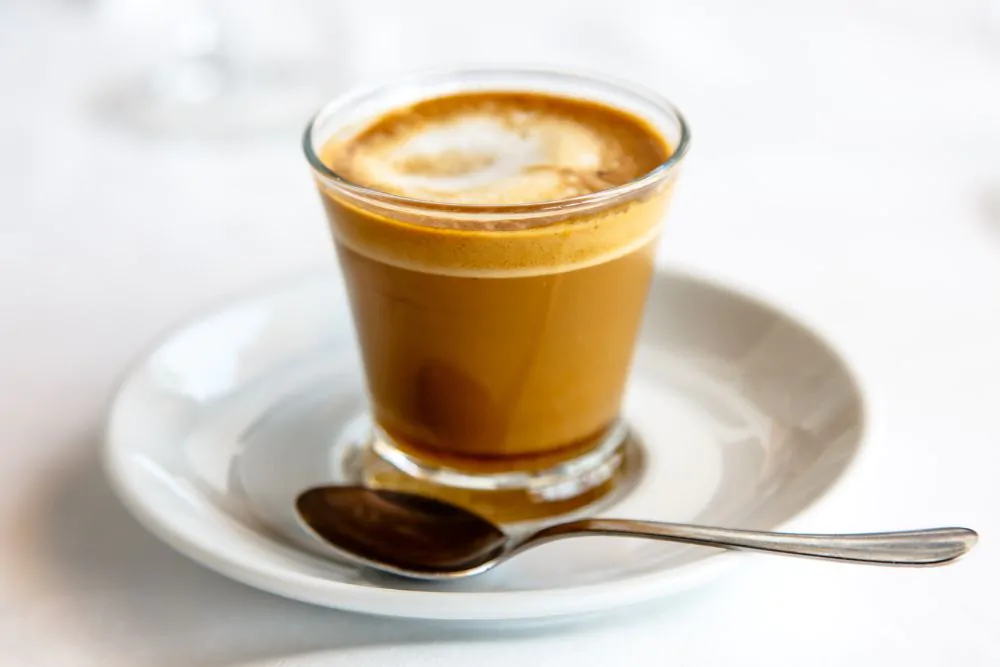 Cortado- spanish coffee with milk in a cup