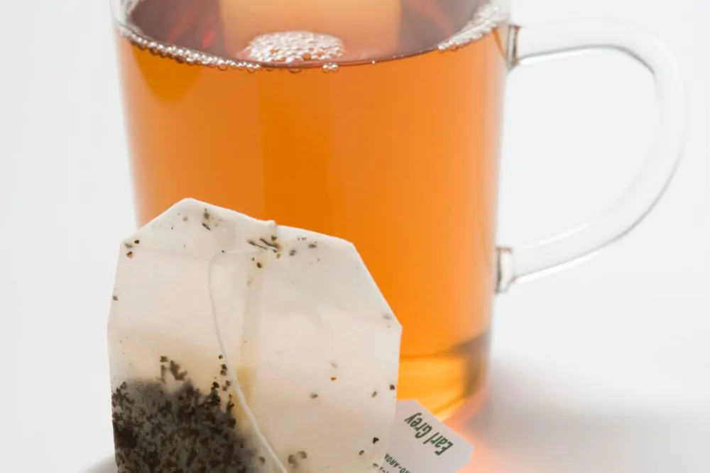 Earl grey tea in a glass cup