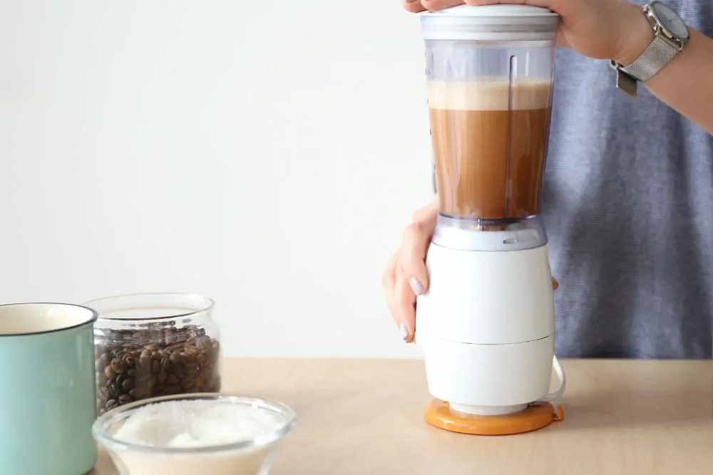 grinding coffee beans in blender
